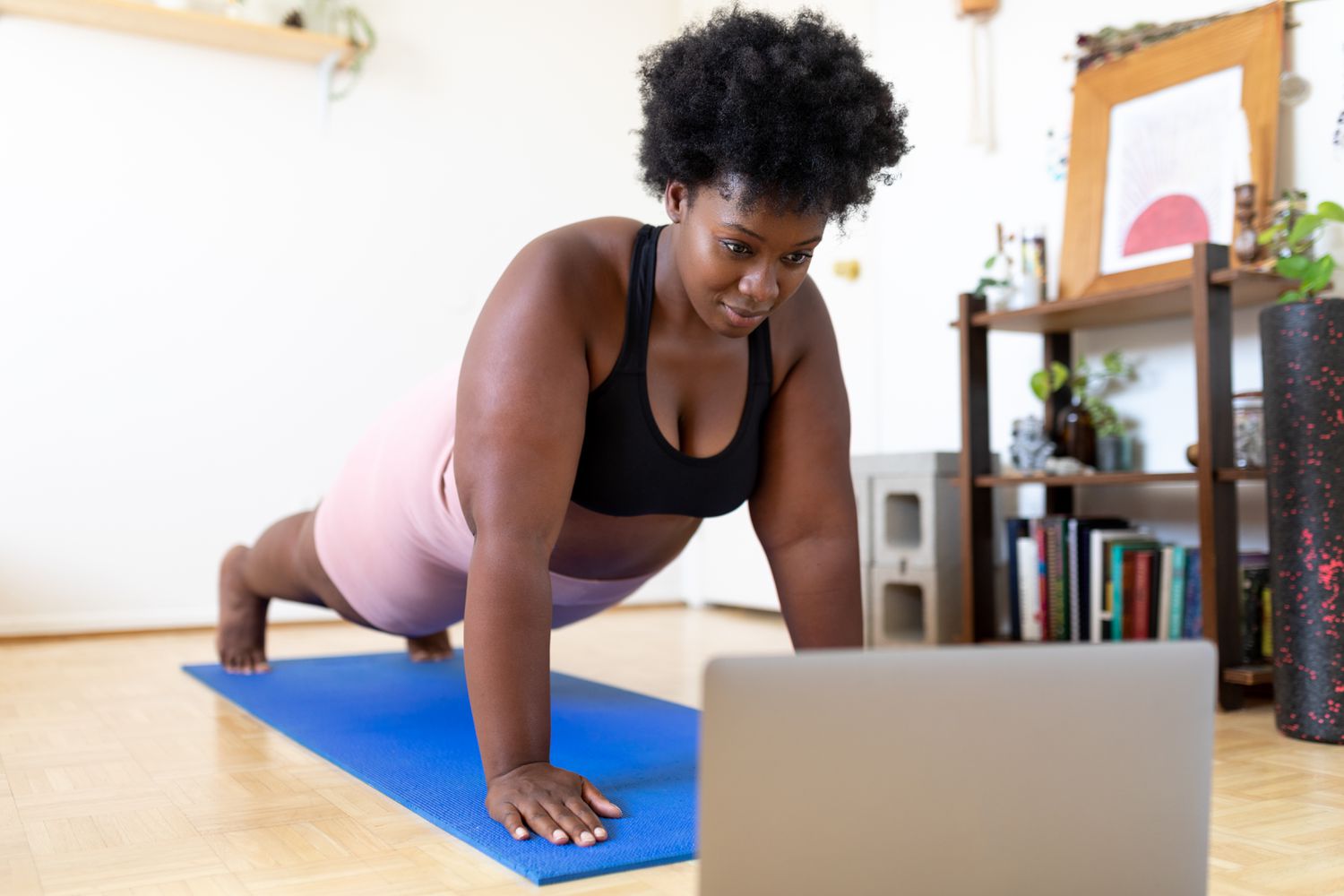 At-Home Program student practicing Pilates during a live virtual class
